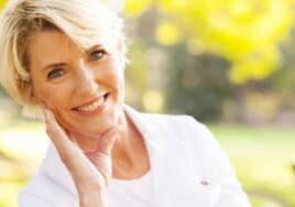 Middle aged woman wondering if hormone replacement therapy safe for menopausal women